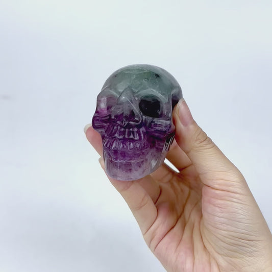 Brings calmness, enhances focus. Rainbow Fluorite Skull